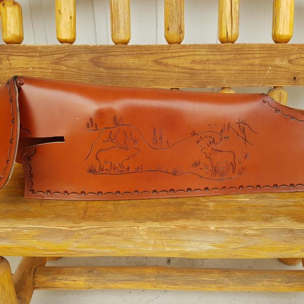 Rifle Scabbards Assorted And Some With Mounting Straps To Attach to What Ever You Ride. Horse Or Horse Powered Vehicle With Wheels. Custom, Full Grain Leather, Hand tooled, Hand made in the Okanagan, Oliver, B.C., Canada.