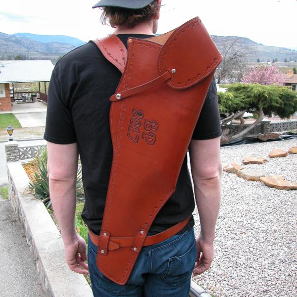 Rifle Scabbards Assorted And Some With Mounting Straps To Attach to What Ever You Ride. Horse Or Horse Powered Vehicle With Wheels. Custom, Full Grain Leather, Hand tooled, Hand made in the Okanagan, Oliver, B.C., Canada.