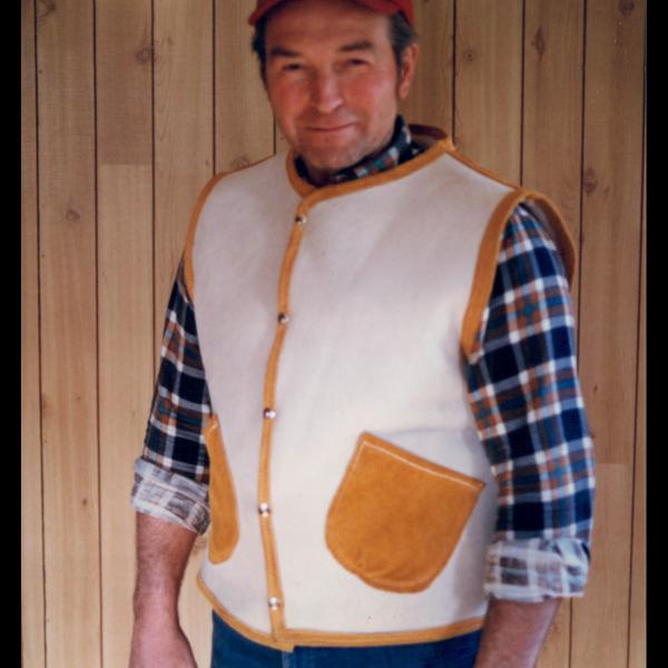 Sheep skin vest with deer skin pockets and trim