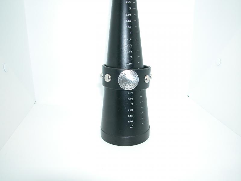 Black Bracelet With A Two Position Snap Accented With A Silver 1/2 Dollar And Studs, Custom, Full Grain Leather, Hand tooled, Hand Made in the Okanagan, Oliver, B.C., Canada.